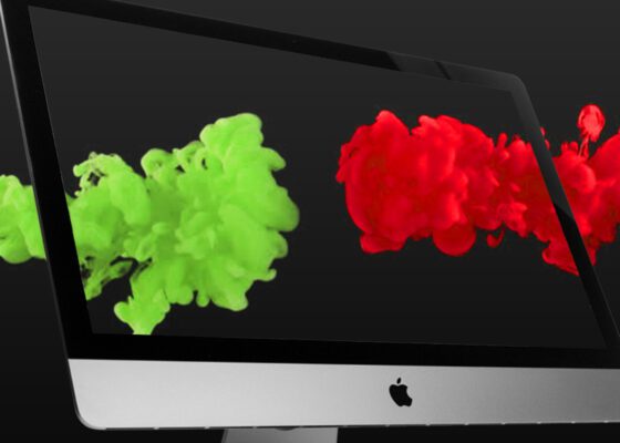 An iMac Screen with cloud colours of green and red on it