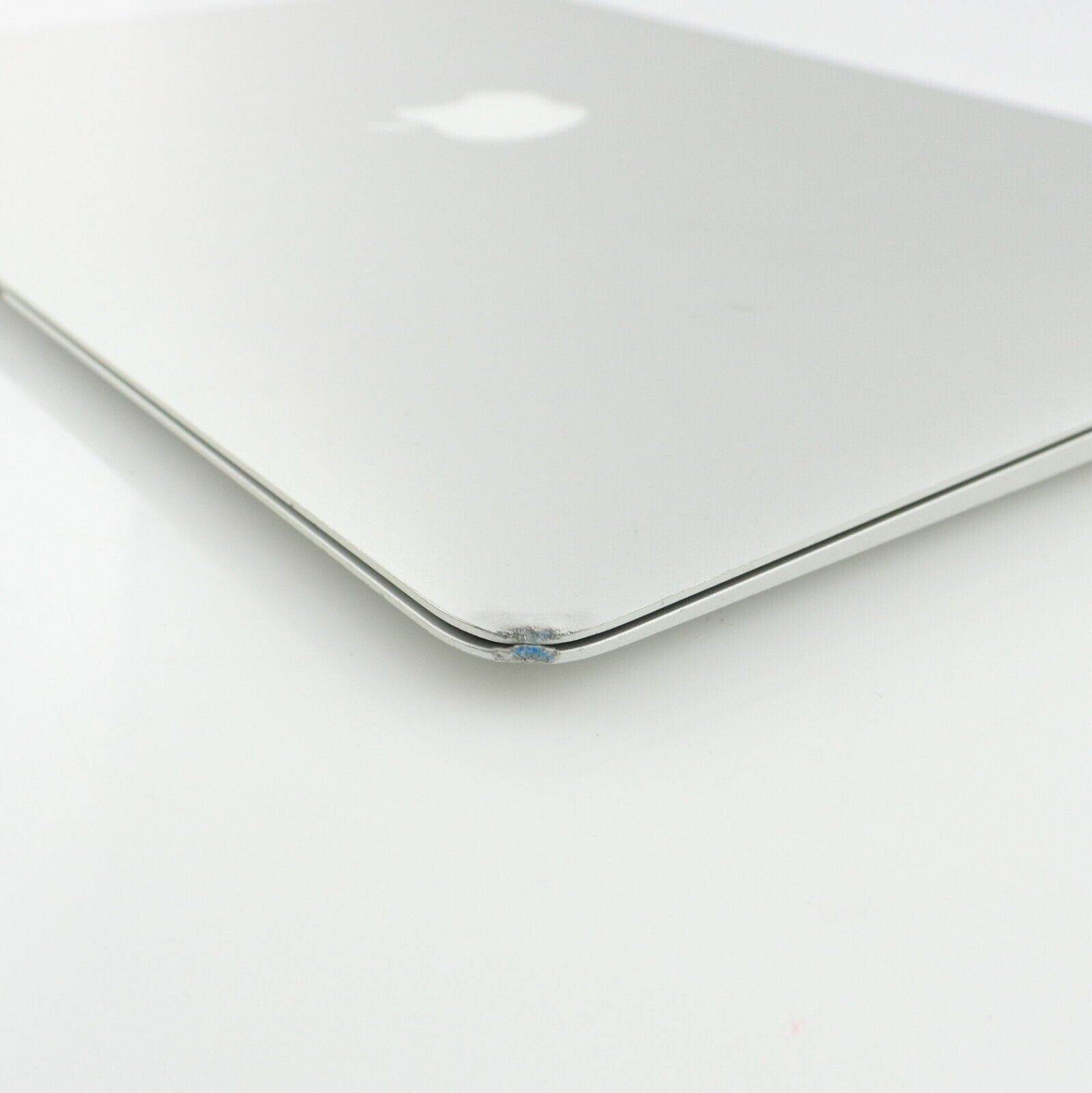 MacBook Air with dented corner