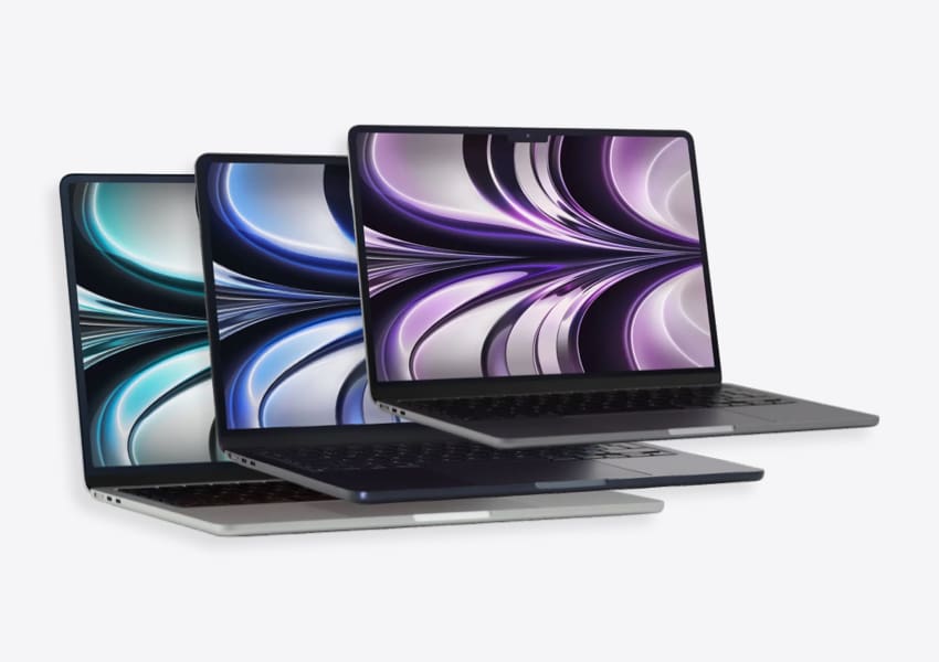 MacBooks Stacked Together